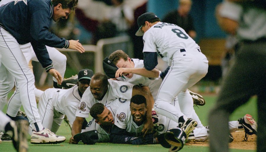 Ken Griffey Jr. scoring the winning run in Game 5 of the American League Division Series at the Kingdome, Seattle, October 8, 1995